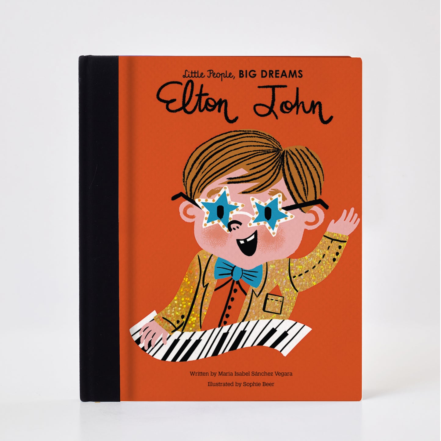 Meet Elton John: the piano wizard who rocketed to stardom with his music. As a child, Elton started playing his grandmother's piano in Harrow, London. He could pick tunes out by ear and was soon attending lessons at the Royal Academy. After answering an advertisement in a newspaper, Elton teamed up with a lyric-writing buddy: Bernie Taupin. The rest was history. Elton's songwriting talent, musical skill, and dazzling outfits have made him one of the all-time greats.